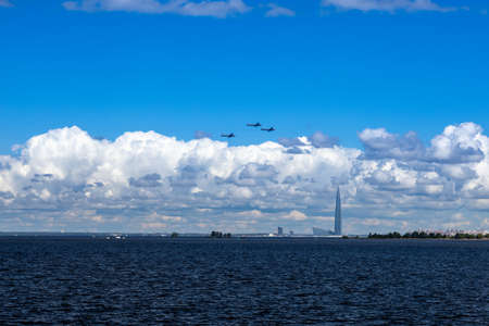 lake and sky and clouds and aircraftの写真素材