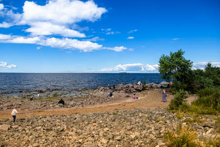 lake and sky and white cloudsの写真素材