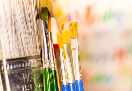 Various paint brushes in the transparent jarの写真素材