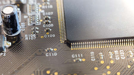 close up computer chips and elements on the boardの写真素材