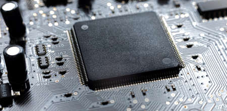 close up computer chips and elements on the boardの写真素材