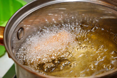 bowl of boiling oil close-up