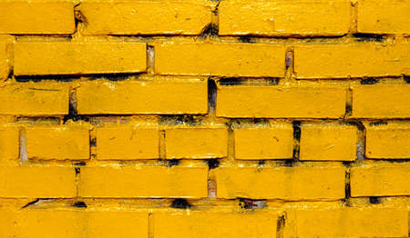 yellow brick wall, structure of stone and cementの写真素材