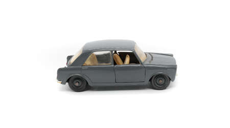 toy car made of metal on white background, isolated object