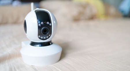 white security camera with wifi has installed on the bedの写真素材