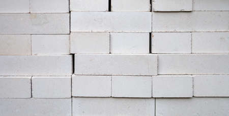 white bricks stacked on top of each other close-up