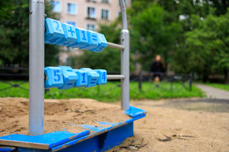 wooden cubes with numbers on the playgroundの写真素材