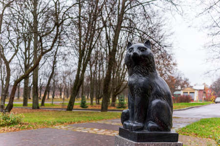 October 30, 2021, Russia, St. Petersburg: figure of a black cat made of granite in the parkのeditorial素材
