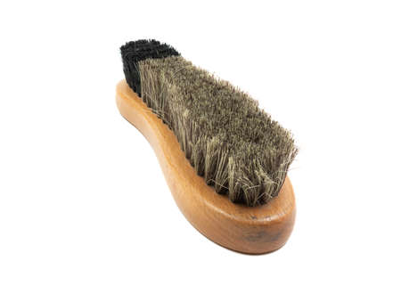 brush for cleaning shoes on a white background close-upの写真素材