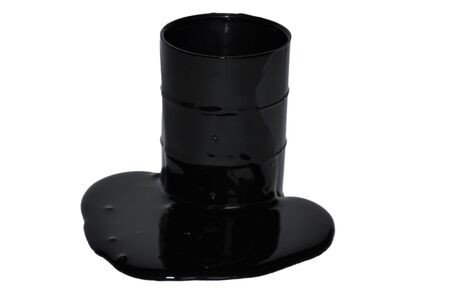 Black oil leaking from a barrel, isolated on white backgroundの写真素材