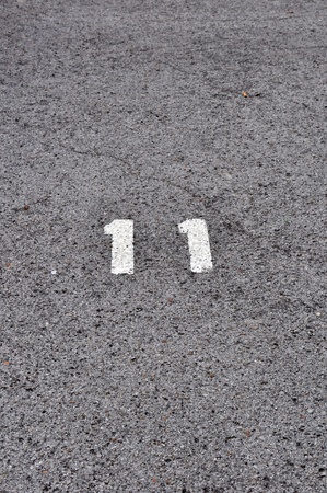 Number 11 on the asphaltの写真素材