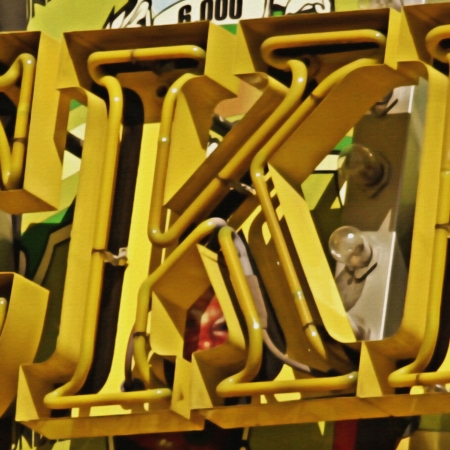 Painting of the letter K in neon with canvas texture.の写真素材