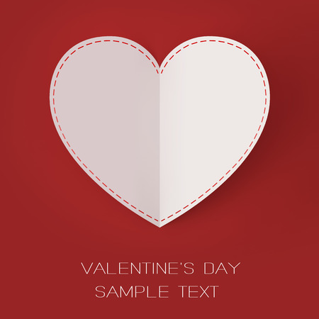 Valentine Day White paper heart on a clear red backgroundの写真素材