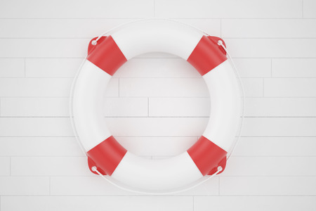 3d illustration of lifebuoy lying on a wooden surfaceの写真素材