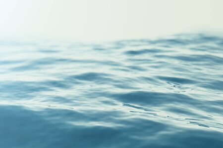 Sea, ocean wave and blue sky background with focus effects. 3d renderingの写真素材