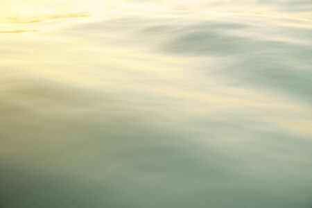 Blue water background with ripples, sea, ocean wave low angle view. Close-up Nature background. Hard focus with selective focus. 3d renderingの写真素材
