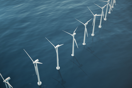 Offshore aerial view of wind turbines in the sea. Clean energy, ecological concept. 3d renderingの写真素材
