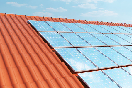 3D illustration solar panels on a red roof reflecting the cloudless blue sky. Energy and electricity. Alternative energy, eco or green generators. Power, ecology, technology, electricity.の写真素材