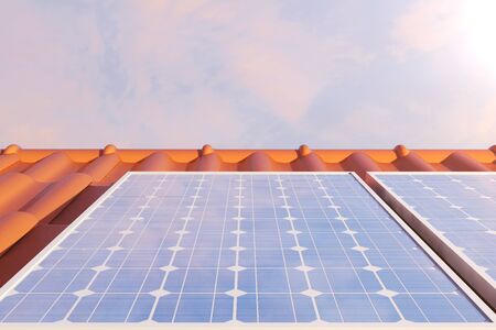 3D illustration solar panels on a red roff, power generation technology. Alternative energy. Solar battery panel modules with scenic sunset with blue sky with sun light.の写真素材
