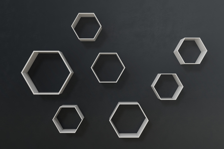 Empty dark or black wall with hexagon shelves on the wall, 3D renderingの写真素材