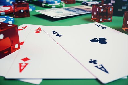 3D illustration casino game. Chips, playing cards for poker. Poker chips, red dice and money on...