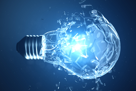 3D illustration Exploding light bulb on a blue background, with concept creative thinking and innovative solutions.の写真素材