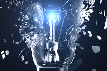 3D illustration Exploding light bulb on a blue background, with concept creative thinking and innovative solutionsの写真素材