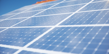 3D illustration solar panels on a red roof of a house. Solar panels with reflection beautiful blue...