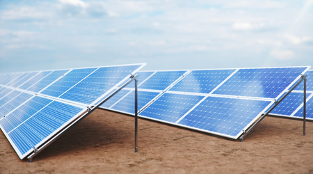 3D illustration Solar Panels. Alternative energy. Concept of renewable energy. Ecological, clean energy. Solar panels, photovoltaic with reflection beautiful blue sky. Solar panels in the desertの写真素材