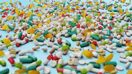 Many different colored tablets, capsules on blue background. Health care concept. Antibiotics inside pills, vitamins. Goods from the pharmacy. Pharmaceutical company, industry, 3d illustrationの写真素材