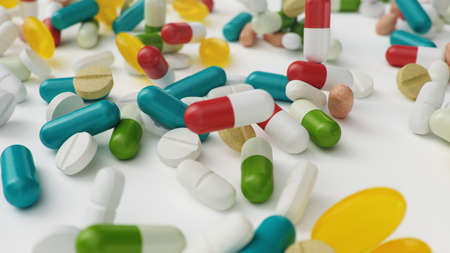 Many different colored tablets, capsules isolate on white background. Health care concept. Antibiotics inside pills, vitamins. Goods from pharmacy. Pharmaceutical company, industry, 3d illustrationの写真素材