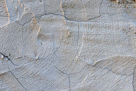 cement, unpolished surface, dry weathered floor surface of gray concrete cement wallの写真素材