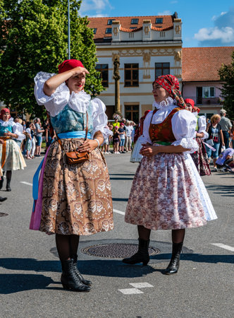 Straznice, Czech Republic - June 25, 2022 International Folklore Festival. Two girls in folk costumes at the Straznice festivalのeditorial素材