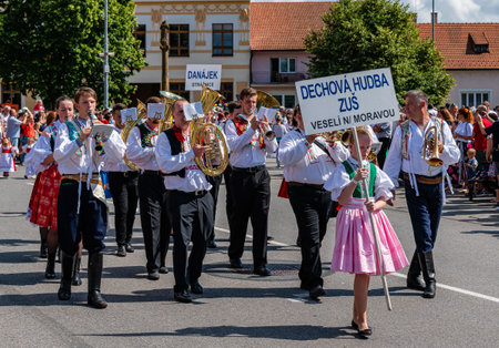 Straznice, Czech Republic - June 25, 2022 International Folklore Festival. Brass music Veseli nad Moravou in folk costumesのeditorial素材