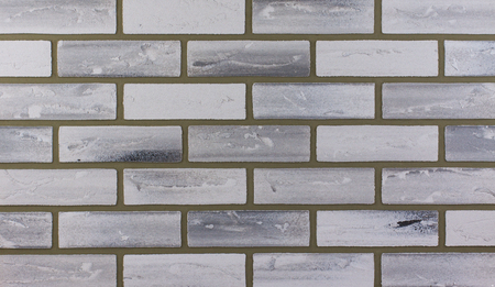 Detailed background of gray brick wall texture