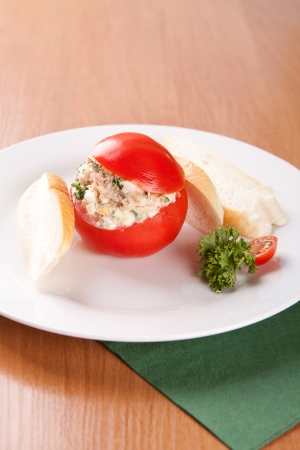 Tomatoes stuffed with spread of eggs, tuna in oil and mayonnaiseの写真素材