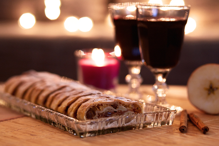 Apple strudel with sugar and mulled wine for Christmasの写真素材