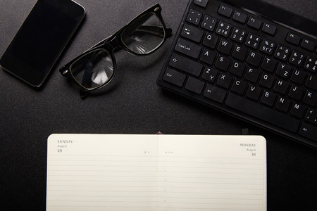 Business work place with equipment, top viewの写真素材