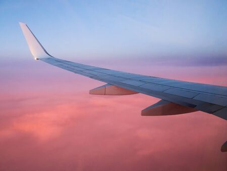 View of the wing aircraft in the sunset