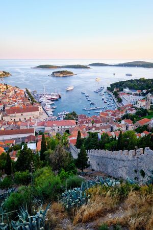 Evening view of old harbor in Hvar town, Croatiaの写真素材