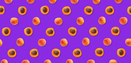Top view of apricot pattern on purple backgroundの写真素材