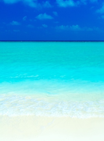 Sand beach and ocean wave, Ari-Atoll. Maldivesの写真素材