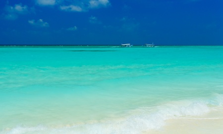 Sand beach and ocean vessels, Ari-Atoll. Maldivesの写真素材