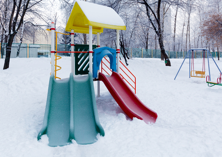 Snowy Children Playground in Moscowの写真素材