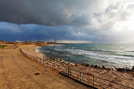 Sea Coast and Ruins of Caesarea Maritima before Sunset, Israelの写真素材