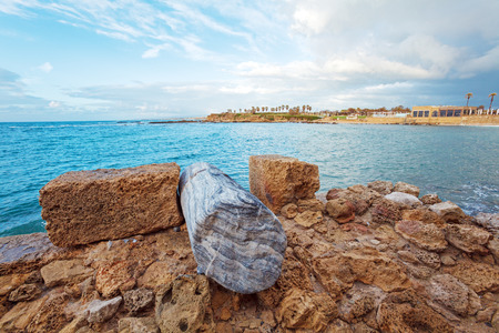 Sea Coast and Ruins of Caesarea Maritima before Sunset, Israelの写真素材