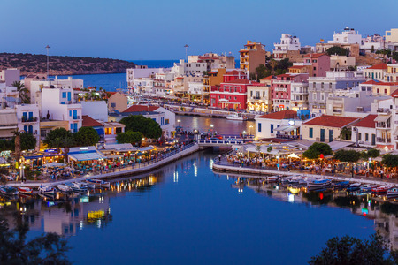 Agios Nikolaos City and Voulismeni Lake at Night  Crete, Greeceの写真素材
