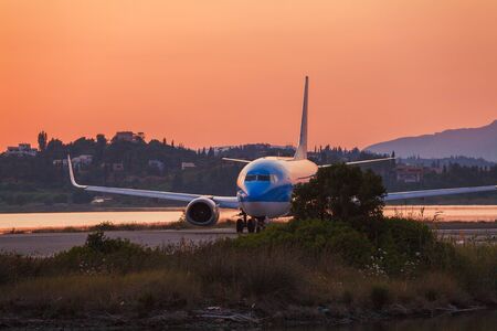 Airplane before take-off, evening scene, Corfuのeditorial素材