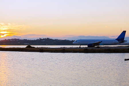 Airplane before take-off, evening scene, Corfuの写真素材