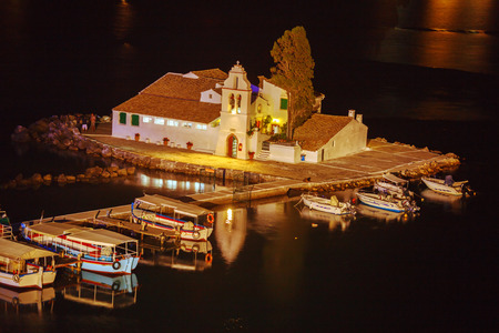 Evening scene of Vlacherna monastery and Pontikonisi island, Kanoni, Corfu, Greeceの写真素材